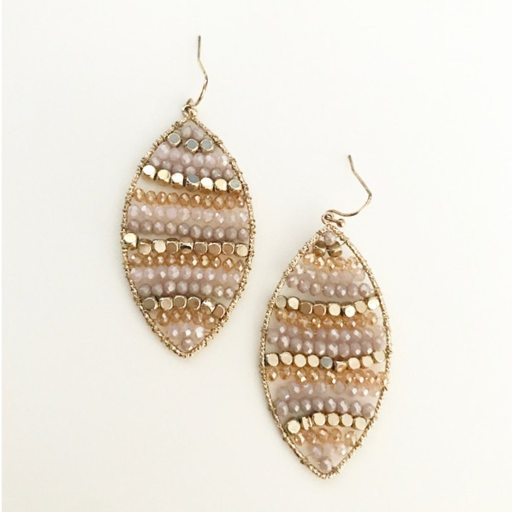 Pink and golden leaf earrings.